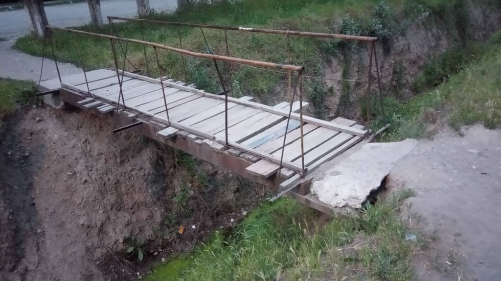 читателя. Мост в городе Токмаке