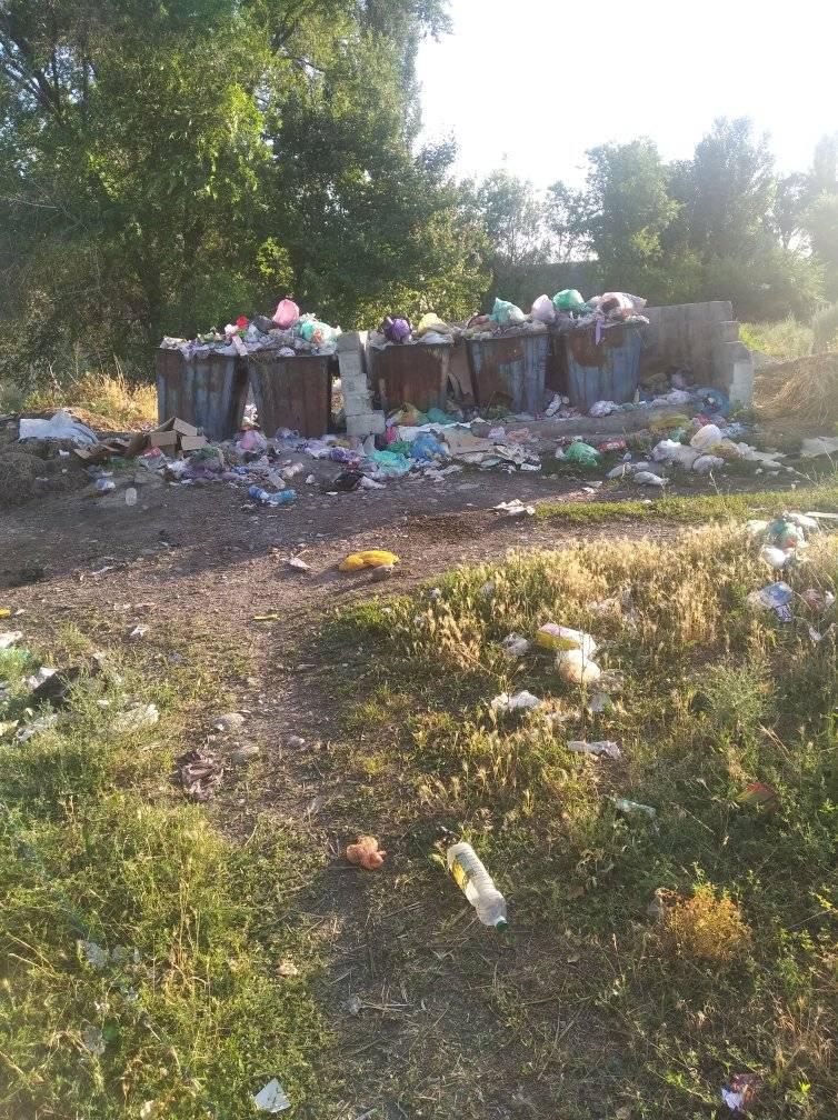 Переполненные мусорные баки в Каинды