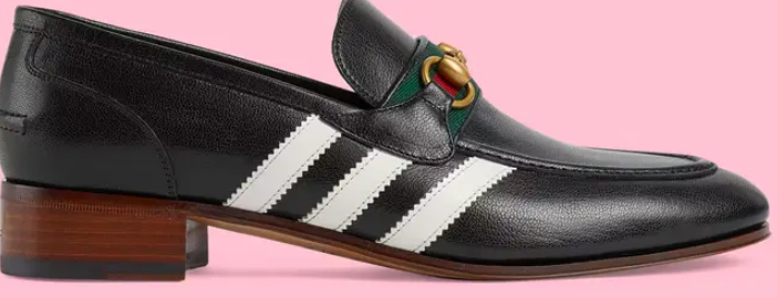 Туфли-бутсы с тремя полосками выпустили Adidas и Gucci